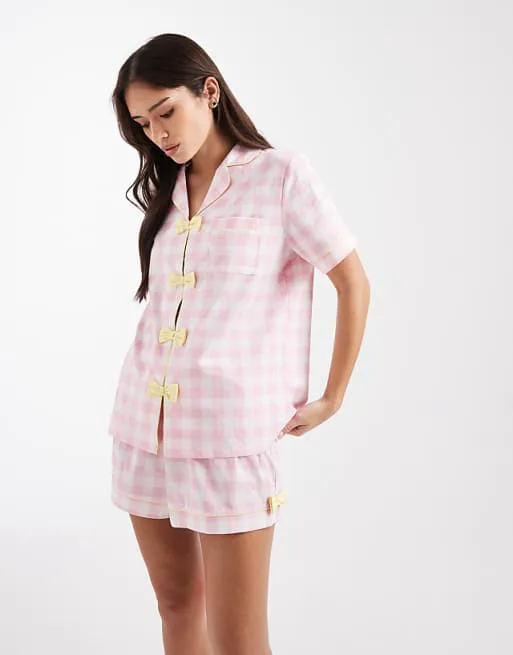 Loungeable woven short sleeve shirt & shorts pyjama set in pink check with lemon bows
Loungeable woven short sleeve shirt & shorts pyjama set in pink check with lemon bows