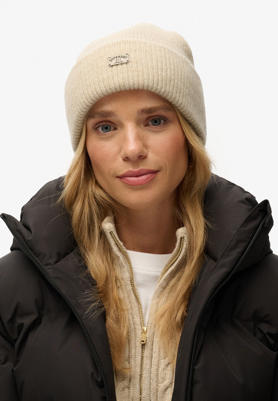 Шапка Superdry & Co Beanie, Oat Bran/Beige
Шапка Superdry & Co Beanie, Oat Bran/Beige