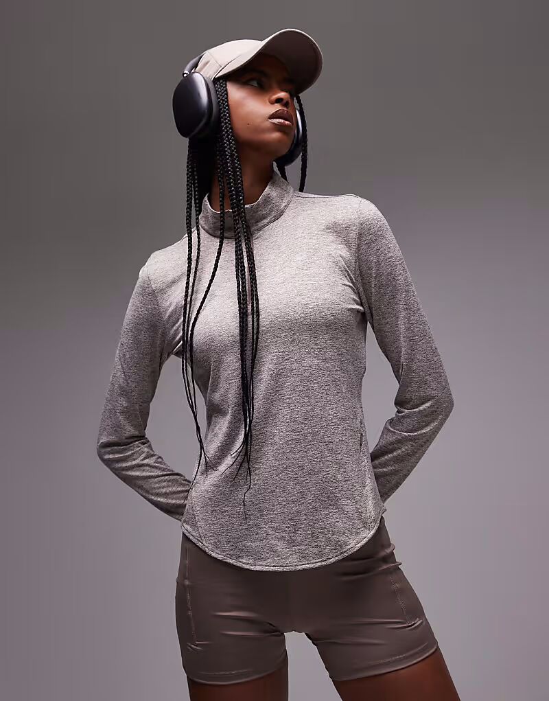 Футболка Nike Running Swift Dri-FIT с длинными рукавами и застежкой-молнией на половину длины коричневого цвета
Футболка Nike Running Swift Dri-FIT с длинными рукавами и застежкой-молнией на половину длины коричневого цвета