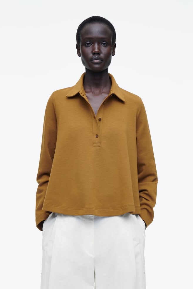 Расклешенная рубашка поло из хлопкового трикотажа Cos, коричневый
Расклешенная рубашка поло из хлопкового трикотажа Cos, коричневый