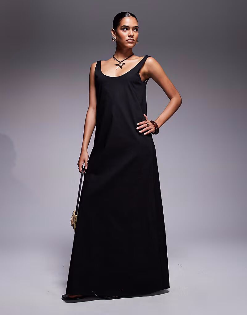 Эксклюзивное платье-трапеция макси из поплина с круглым вырезом черного цвета Fashionkilla
Эксклюзивное платье-трапеция макси из поплина с круглым вырезом черного цвета Fashionkilla