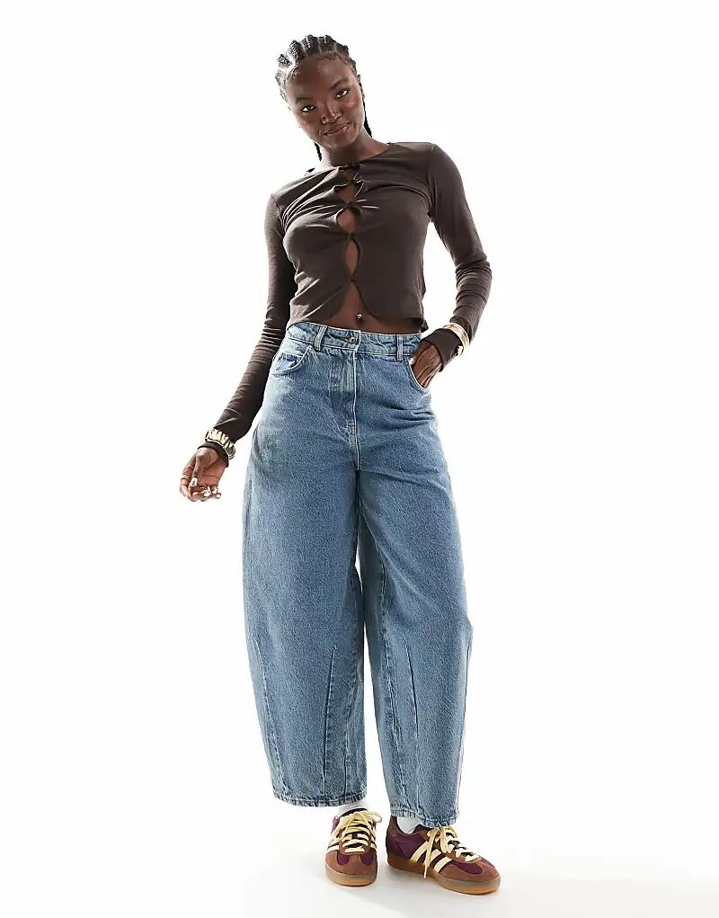 COLLUSION джинсы-баллоны в средней стирке
COLLUSION джинсы-баллоны в средней стирке