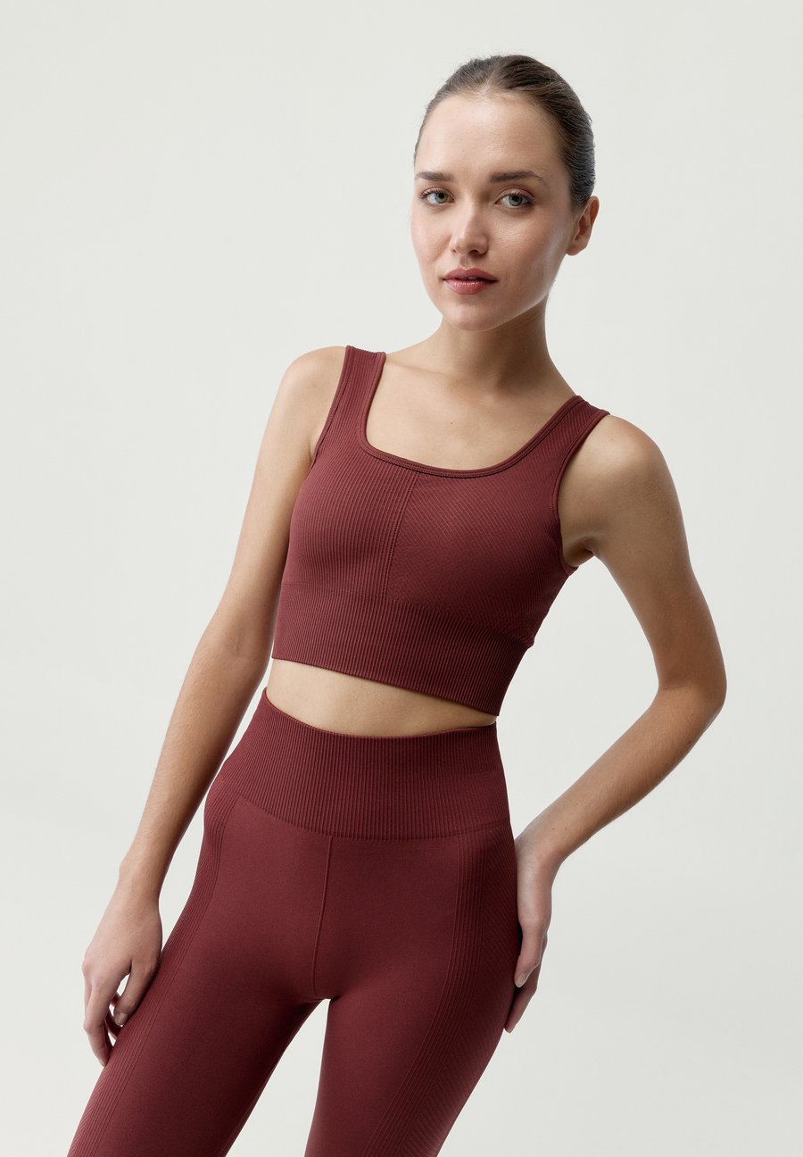 Бюстгальтер Born Living Yoga IDARA, Burdeos/Bordeaux
Бюстгальтер Born Living Yoga IDARA, Burdeos/Bordeaux