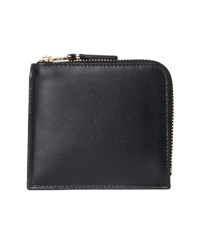 Кожаный кошелек с принтом Comme Des Garçons, черный
Кожаный кошелек с принтом Comme Des Garçons, черный