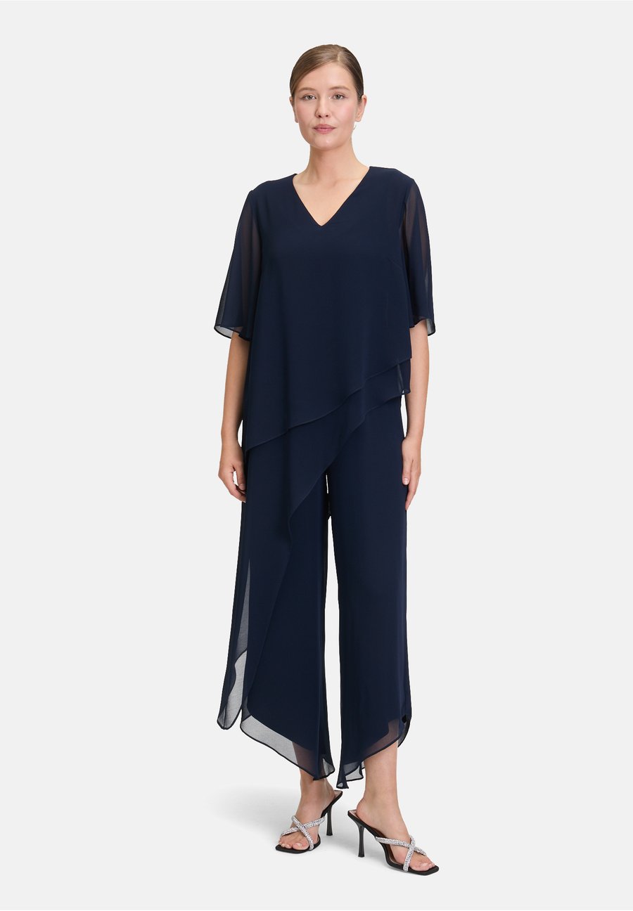 Комбинезон Vera Mont Jumpsuit, Night Sky/Blue
Комбинезон Vera Mont Jumpsuit, Night Sky/Blue