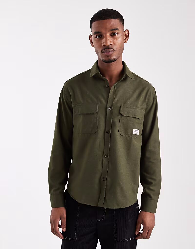 Свободная рубашка цвета хаки с нашивкой Asos Design
Свободная рубашка цвета хаки с нашивкой Asos Design