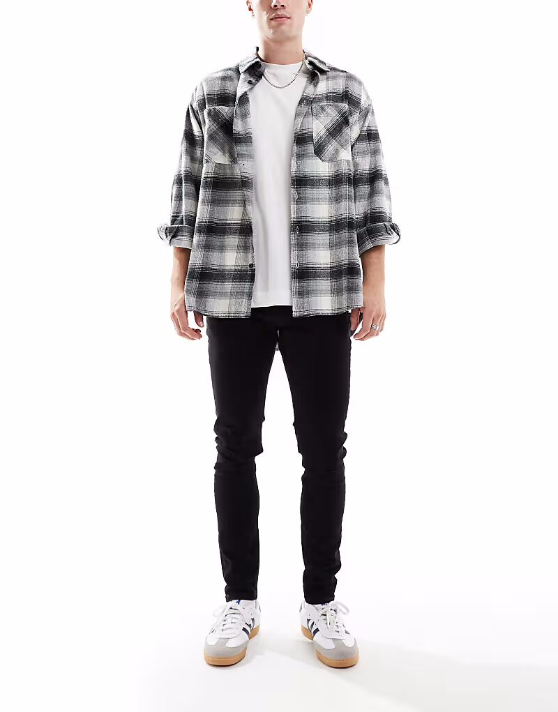 Зауженные джинсы Mike черного цвета Jack & Jones
Зауженные джинсы Mike черного цвета Jack & Jones