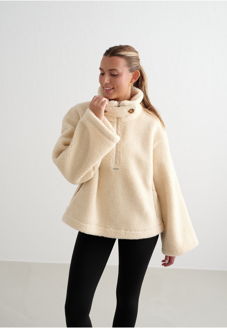 Флисовая куртка aim’n Fleece jacket, Almond White/White
Флисовая куртка aim’n Fleece jacket, Almond White/White