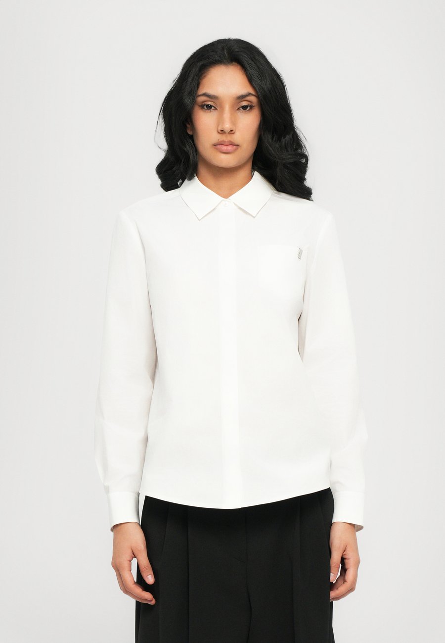 Блуза Tory Burch Button-down blouse, White
Блуза Tory Burch Button-down blouse, White