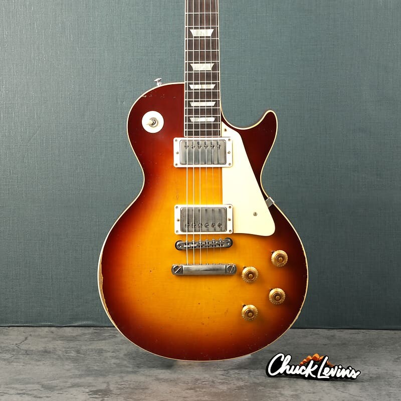 Электрогитара Gibson Murphy Lab 1958 Les Paul Standard - Ultra Heavy Aged Royal Tea Burst - CHUCKSCLUSIVE - #821495
Электрогитара Gibson Murphy Lab 1958 Les Paul Standard - Ultra Heavy Aged Royal Tea Burst - CHUCKSCLUSIVE - #821495