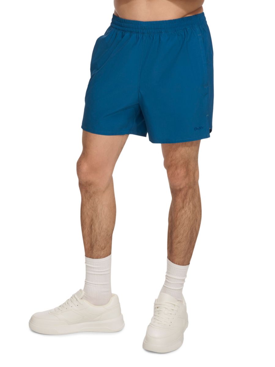 Гибридные стандартные шорты для волейбола DKNY, цвет Poseidon
Гибридные стандартные шорты для волейбола DKNY, цвет Poseidon