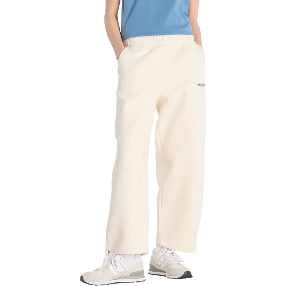 Спортивные брюки New Balance Reimagined Barrel Leg, бежевый 
Спортивные брюки New Balance Reimagined Barrel Leg, бежевый