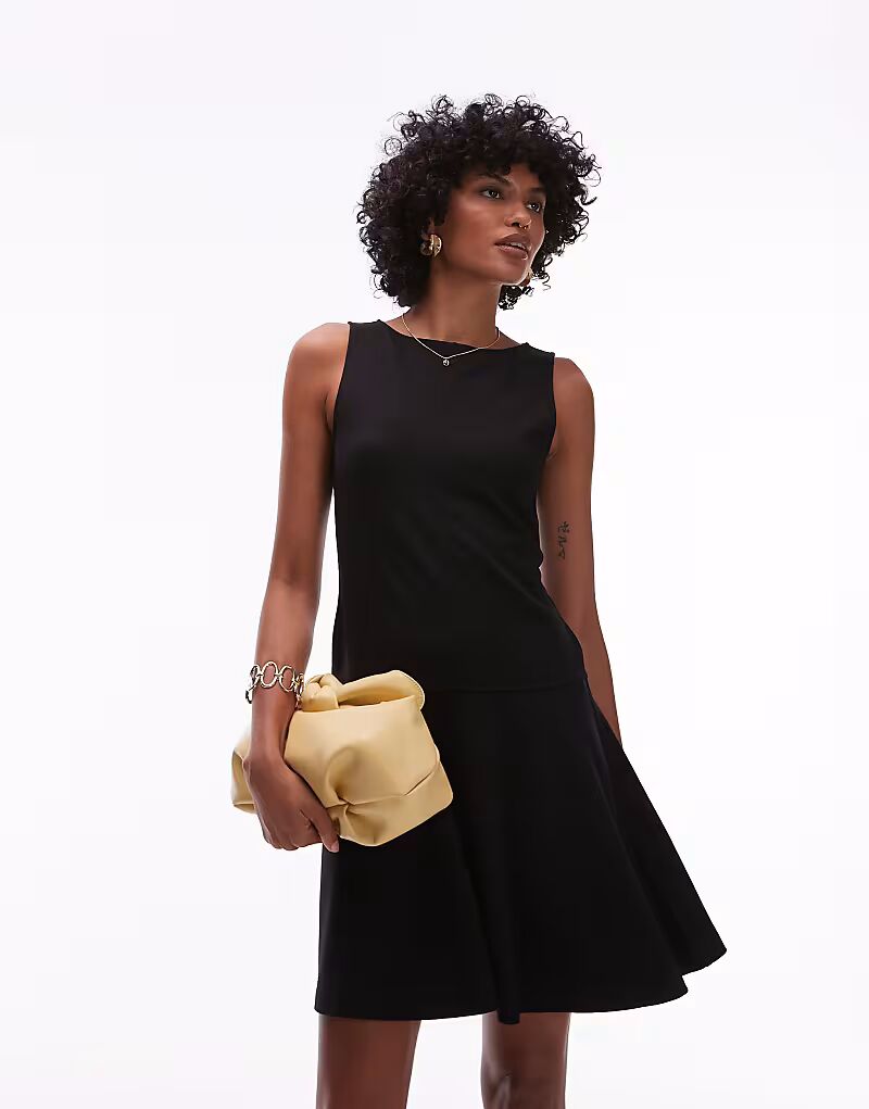 & Other Stories трикотажное мини-платье с вырезом-лодочкой и расклешенным подолом черного цвета 
& Other Stories трикотажное мини-платье с вырезом-лодочкой и расклешенным подолом черного цвета