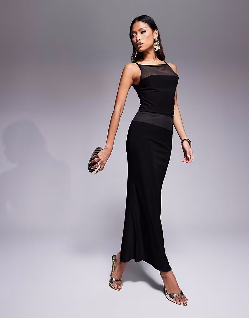 Юбка макси из коллекции ASOS DESIGN с сетчатой вставкой, обтягивающего черного цвета
Юбка макси из коллекции ASOS DESIGN с сетчатой вставкой, обтягивающего черного цвета