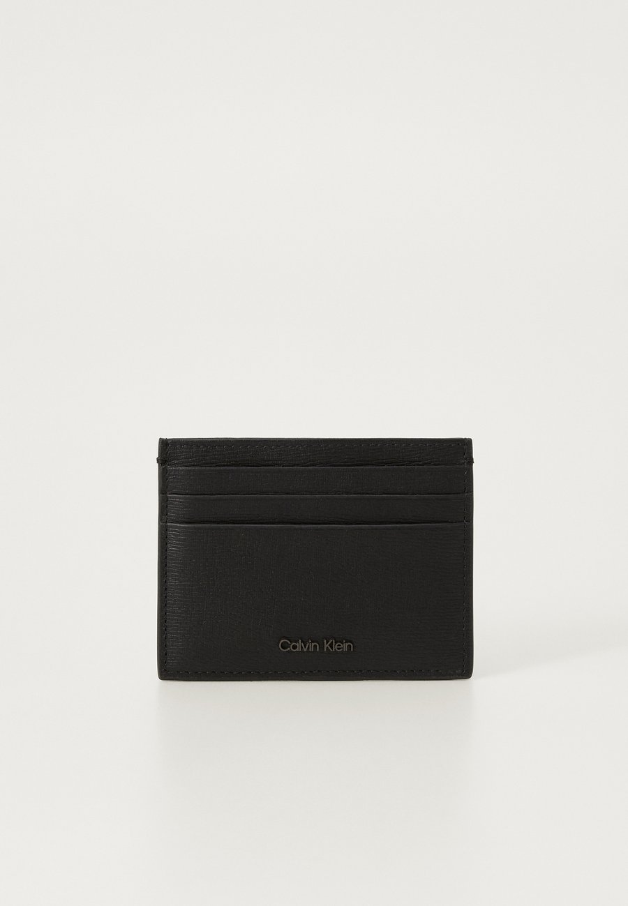 Кошелек Calvin Klein LOGO HARDWARE SAFFIA, Black
Кошелек Calvin Klein LOGO HARDWARE SAFFIA, Black