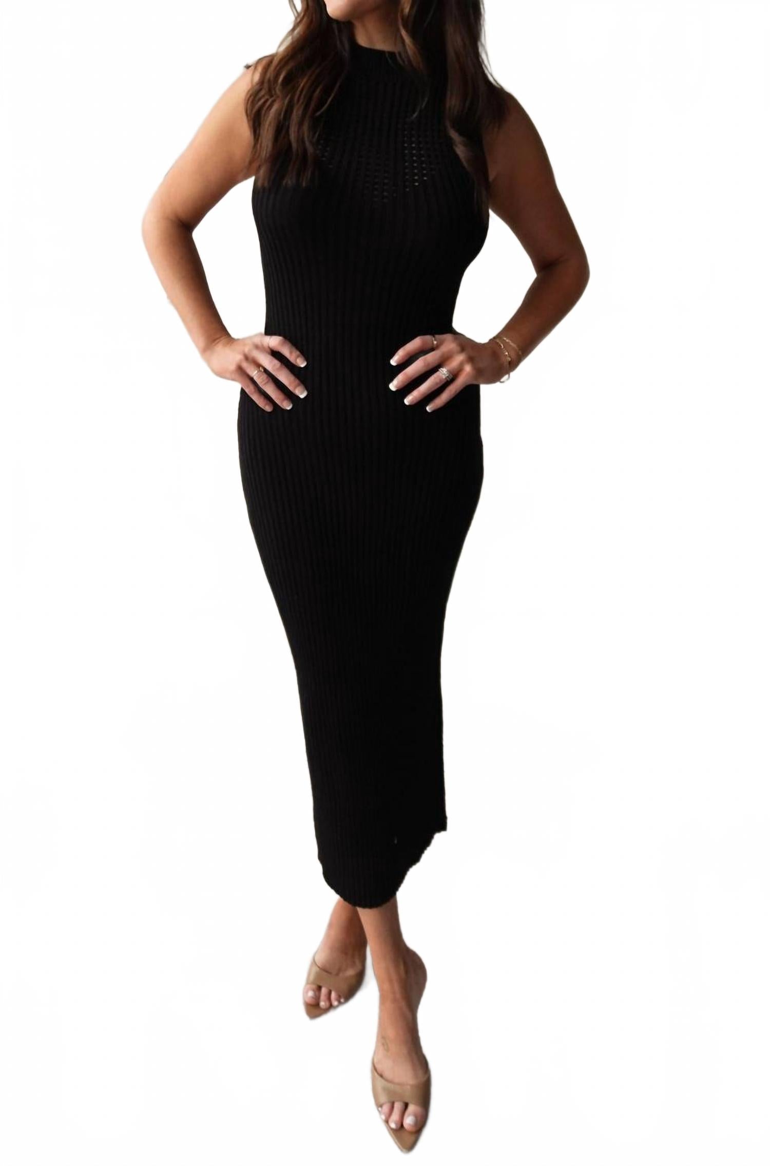 Черное платье с воротником-стойкой и ажурной вязкой LE LIS
Черное платье с воротником-стойкой и ажурной вязкой LE LIS