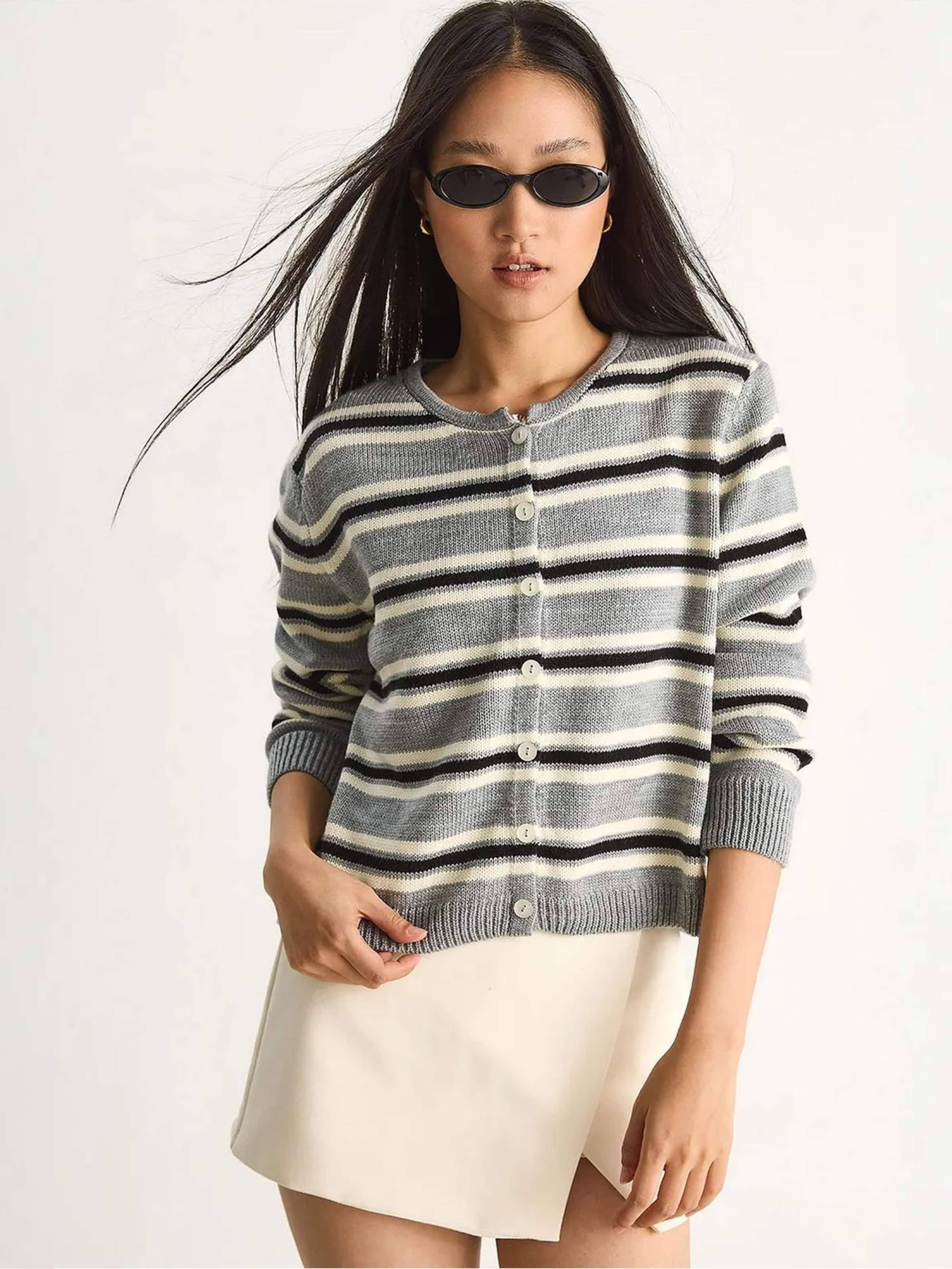 Bianco Lucci Вязаный кардиган в крапчатом сером
Bianco Lucci Вязаный кардиган в крапчатом сером