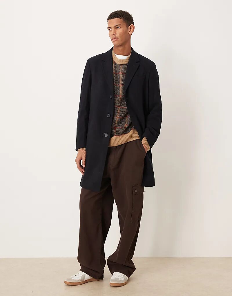 Пальто строгого покроя из смеси шерсти Mango темно-синего цвета
Пальто строгого покроя из смеси шерсти Mango темно-синего цвета