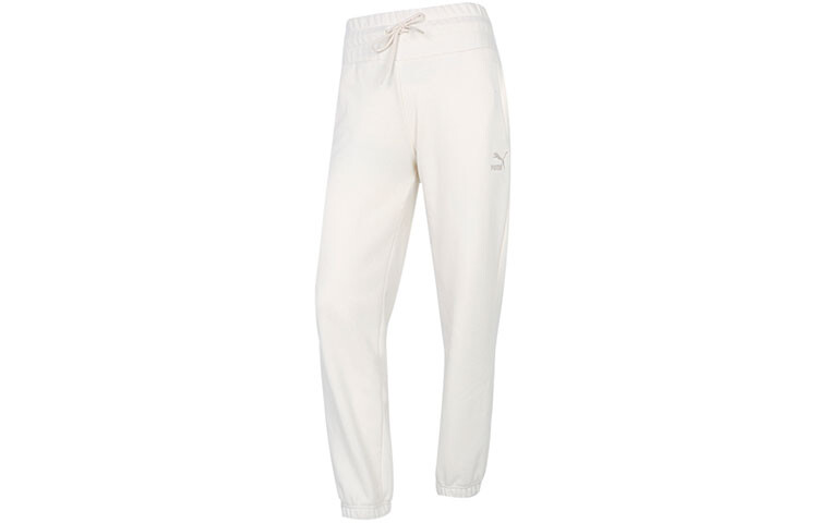 Трикотажные спортивные штаны женские белые Puma
Трикотажные спортивные штаны женские белые Puma