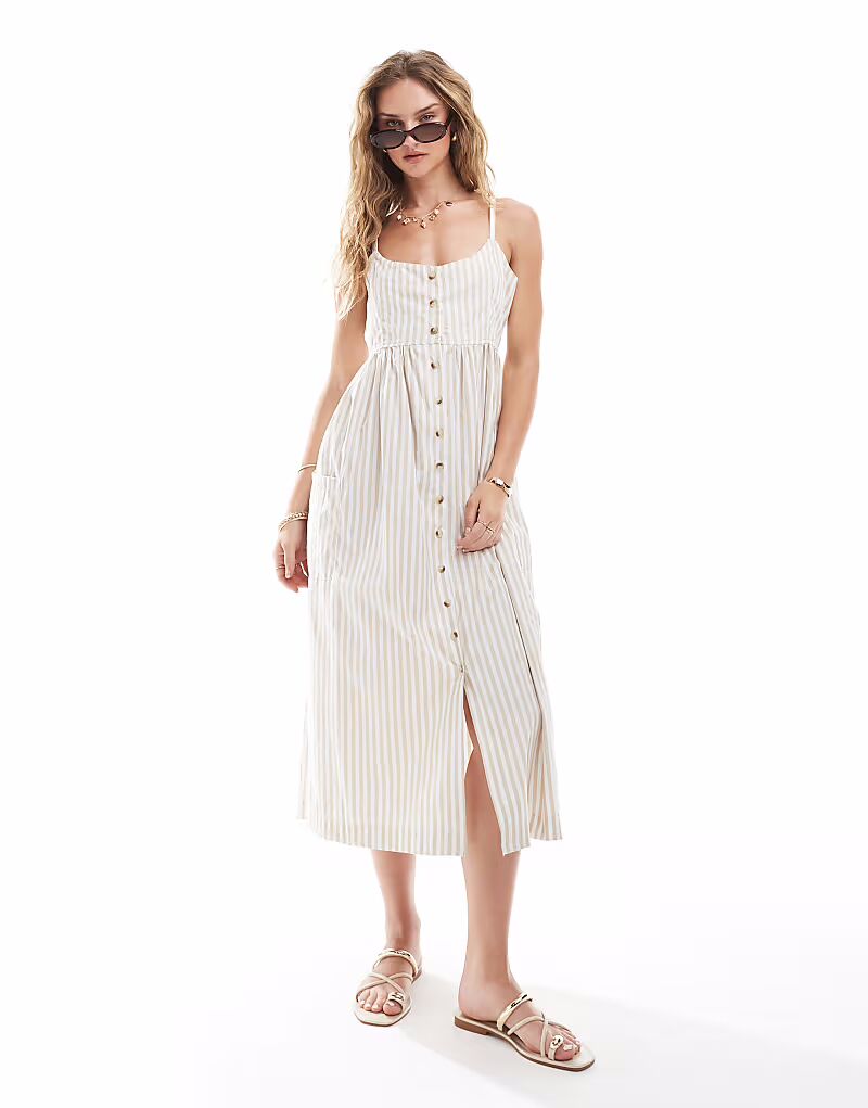 Платье миди Brave Soul на пуговицах с бретельками в полоску цвета камня
Платье миди Brave Soul на пуговицах с бретельками в полоску цвета камня