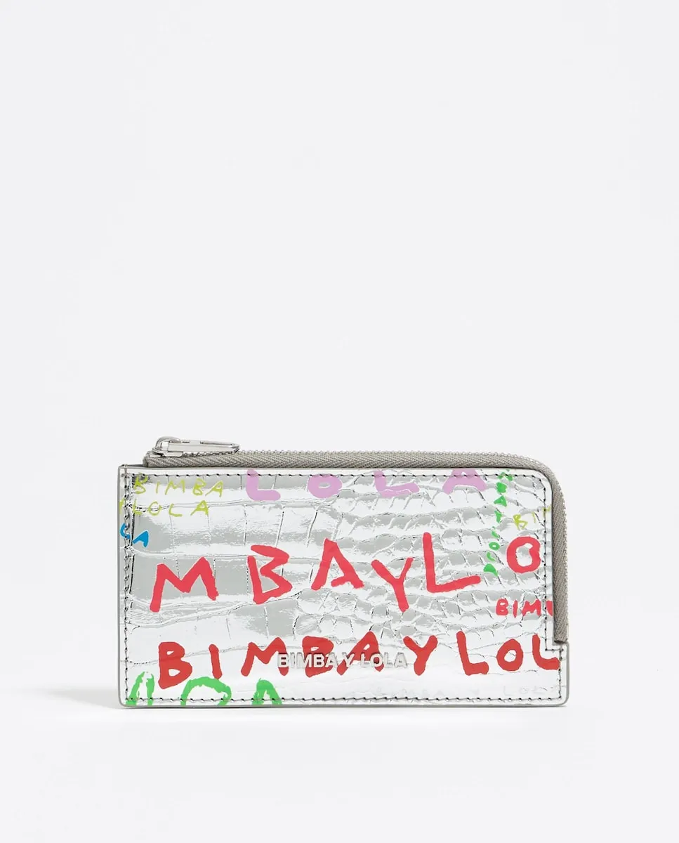 Женский визитник с гравировкой под крокодила Bimba Y Lola, серебряный
Женский визитник с гравировкой под крокодила Bimba Y Lola, серебряный