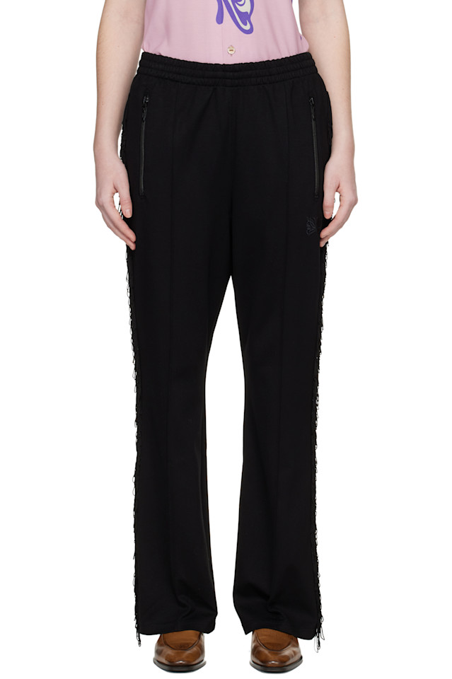 Needles Черные спортивные брюки-клеш с бахромой
Needles Черные спортивные брюки-клеш с бахромой