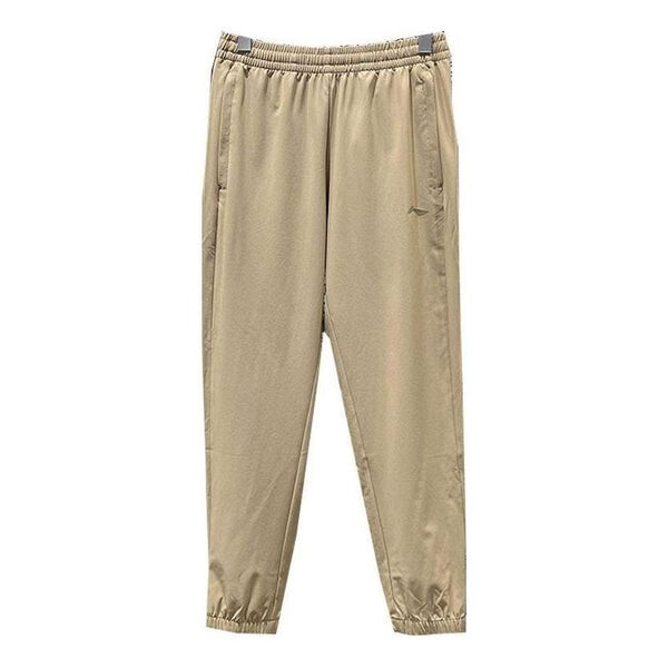 Брюки тренировочные серии спортивные брюки карго Li-Ning, бежевый
Брюки тренировочные серии спортивные брюки карго Li-Ning, бежевый