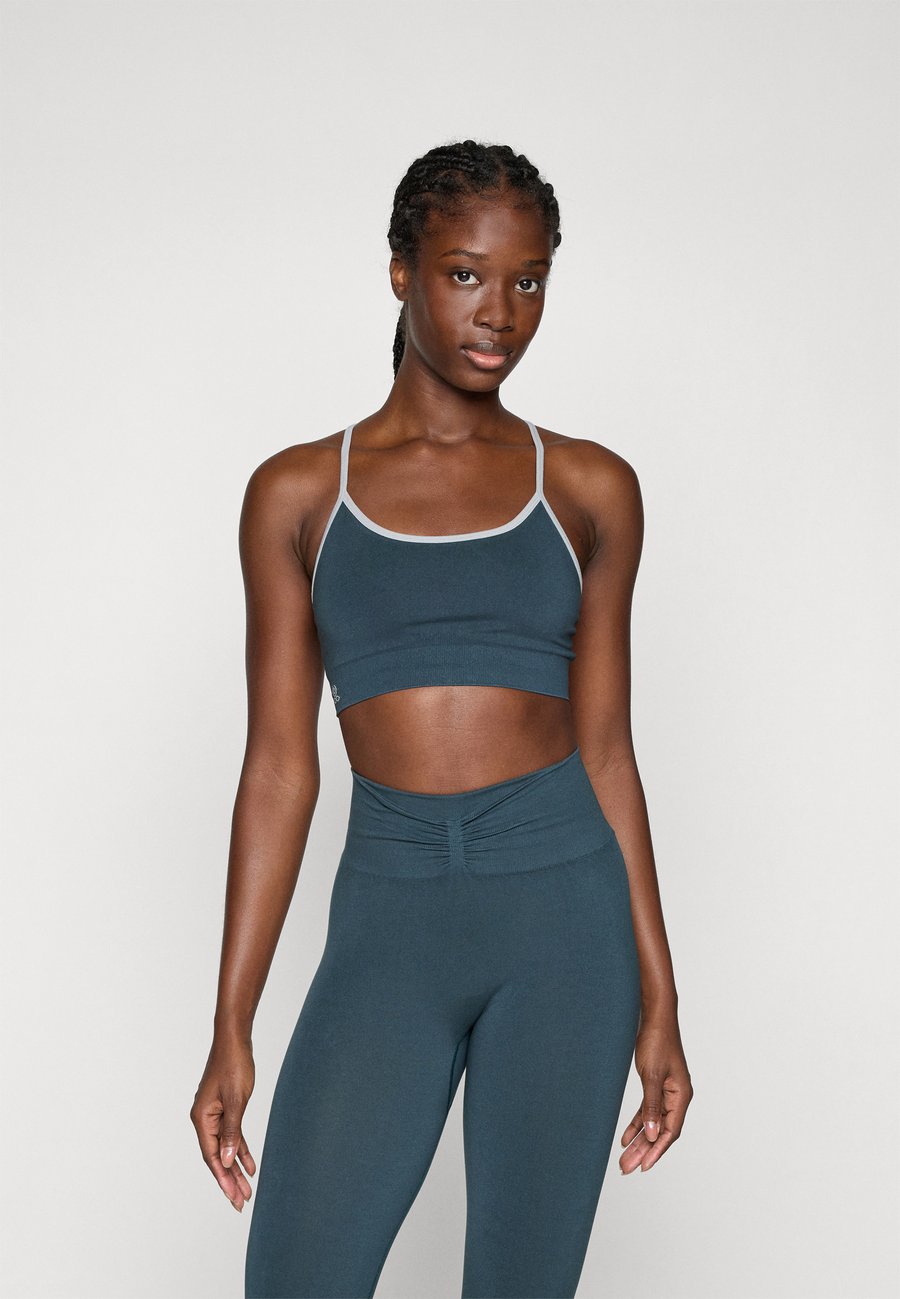 Бюстгальтер Yogasearcher DHARMA SEAMLESS BRA, Forest/Dark Green
Бюстгальтер Yogasearcher DHARMA SEAMLESS BRA, Forest/Dark Green