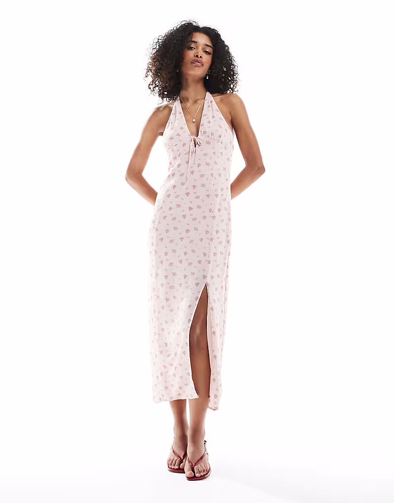 Платье макси Bershka с вырезом халтерне в розовых тонах с цветочным принтом
Платье макси Bershka с вырезом халтерне в розовых тонах с цветочным принтом