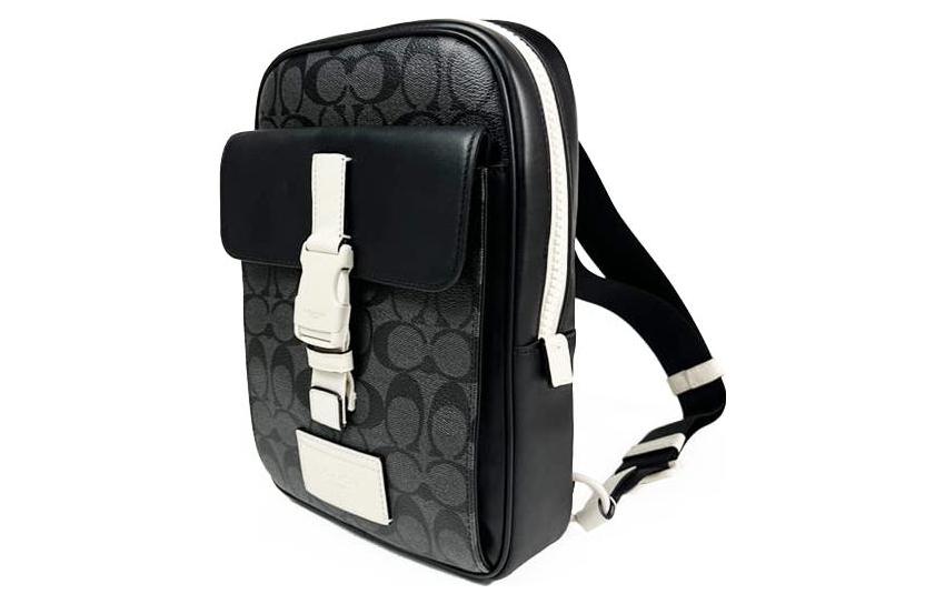 Сумка через плечо Coach черно-белая мужская большая из холста с кожаными вставками
Сумка через плечо Coach черно-белая мужская большая из холста с кожаными вставками