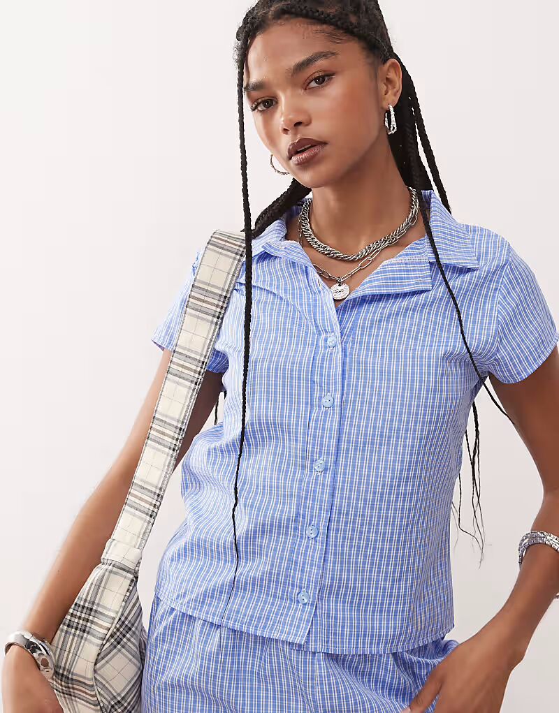 Рубашка микрофибры с короткими рукавами в синюю клетку Reclaimed Vintage
Рубашка микрофибры с короткими рукавами в синюю клетку Reclaimed Vintage