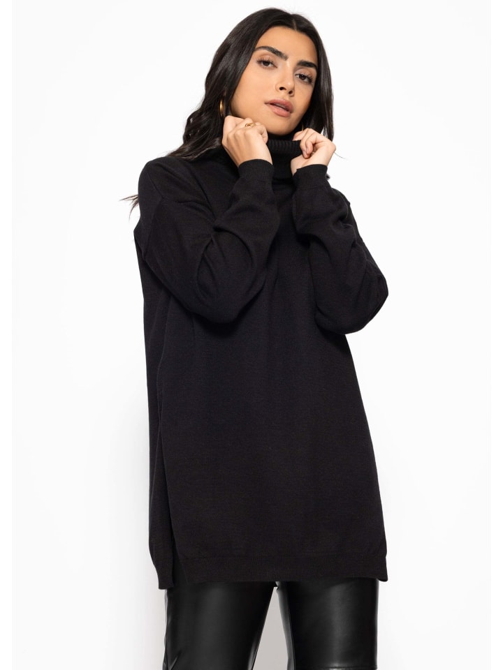 Водолазка свободного кроя с длинными боковыми разрезами черного цвета SASSYCLASSY
Водолазка свободного кроя с длинными боковыми разрезами черного цвета SASSYCLASSY