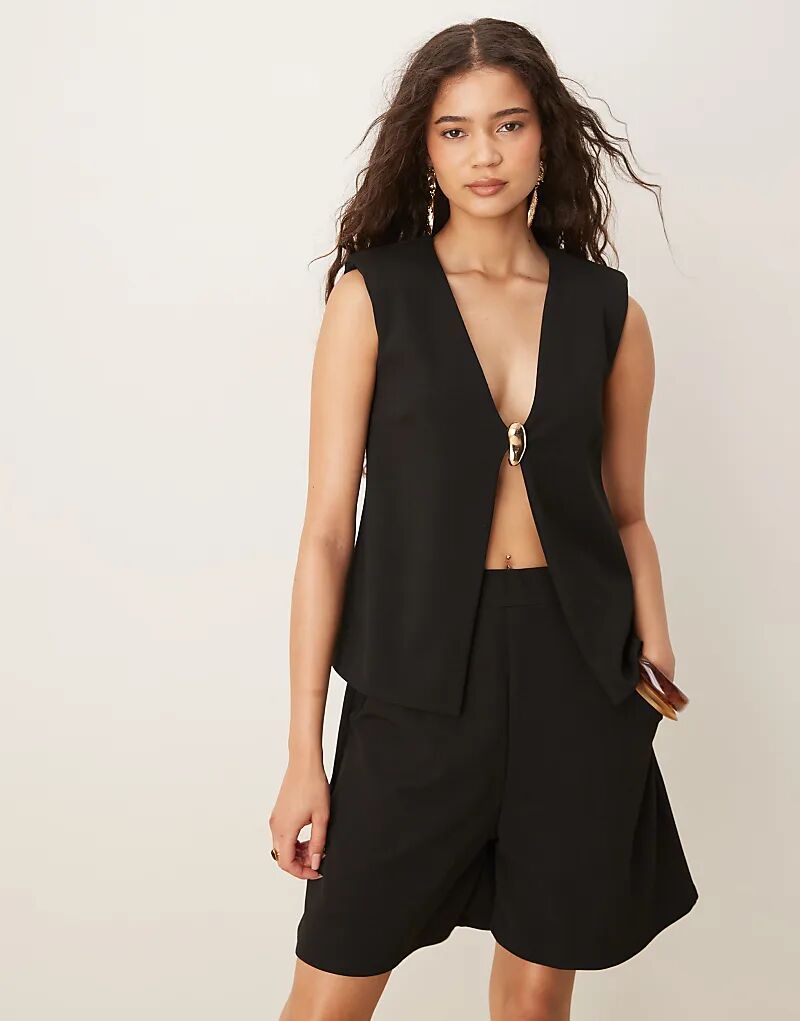 Жилет ASOS DESIGN из водолазного материала с золотой отделкой и застежкой черного цвета
Жилет ASOS DESIGN из водолазного материала с золотой отделкой и застежкой черного цвета