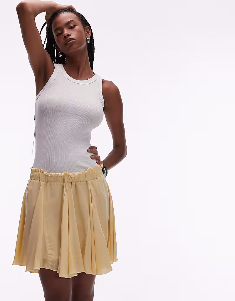 Мини-юбка Topshop из хлопка с люверсами цвета пахты
Мини-юбка Topshop из хлопка с люверсами цвета пахты