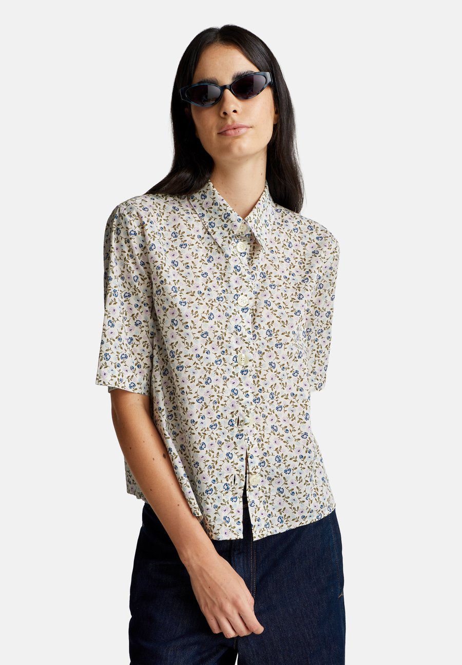 Блуза United Colors of Benetton SHORT SLEEVE PATTERNED, Cream/Off-White
Блуза United Colors of Benetton SHORT SLEEVE PATTERNED, Cream/Off-White