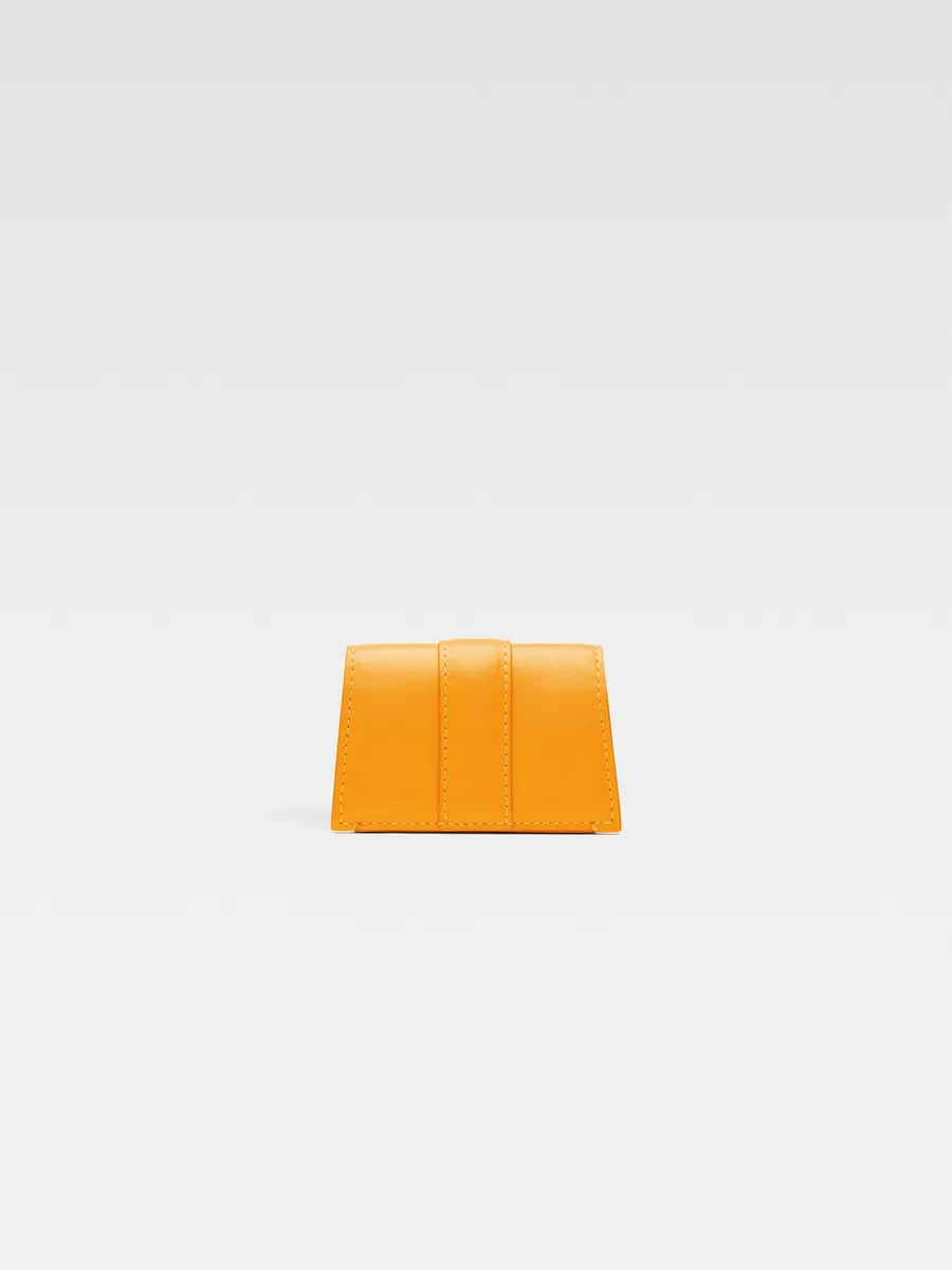 Миниатюрный чехол для AirPods с клапаном Порт Бамбино Jacquemus, темно-оранжевый
Миниатюрный чехол для AirPods с клапаном Порт Бамбино Jacquemus, темно-оранжевый