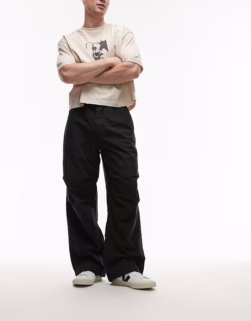 Брюки-карго Calvin Klein Jeans на завязках черного цвета
Брюки-карго Calvin Klein Jeans на завязках черного цвета