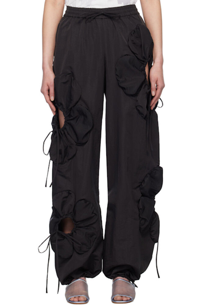 Черные брюки для отдыха с цветочным принтом J.Kim
Черные брюки для отдыха с цветочным принтом J.Kim