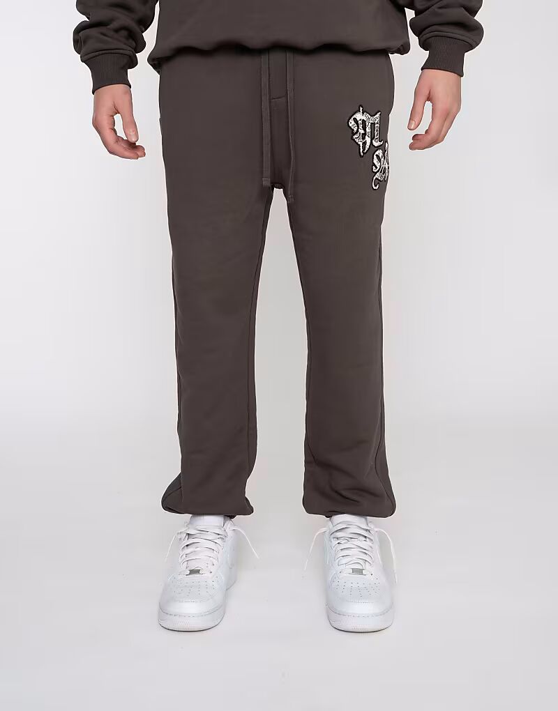 Multiply Apparel - спортивные брюки с логотипом турецкого кофе и пейсли 
Multiply Apparel - спортивные брюки с логотипом турецкого кофе и пейсли