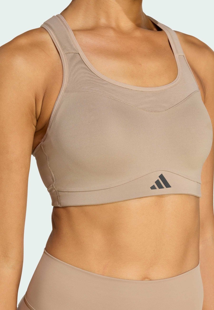 Бюстгальтер Adidas Performance IMPACT HIGH SUPPORT BRA, Chalky Brown/Brown
Бюстгальтер Adidas Performance IMPACT HIGH SUPPORT BRA, Chalky Brown/Brown