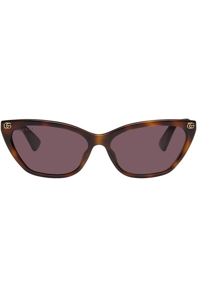 Светлые ацетатные солнцезащитные очки cat eye GG Gucci, цвет havana
Светлые ацетатные солнцезащитные очки cat eye GG Gucci, цвет havana