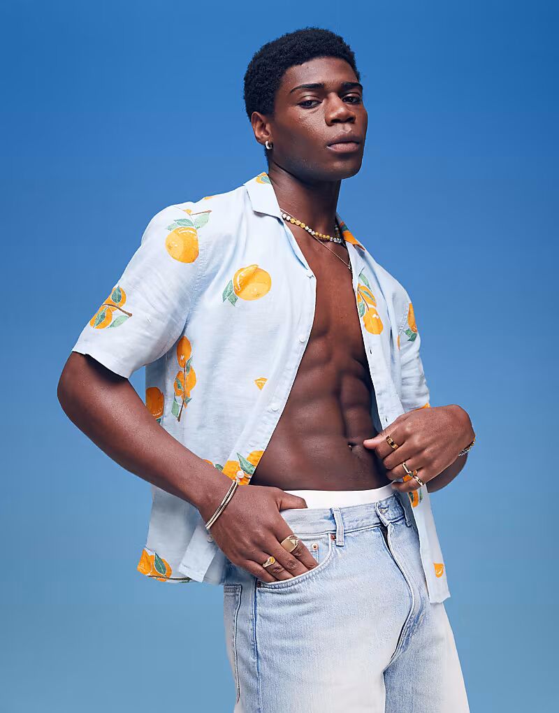 Оранжевая льняная рубашка с короткими рукавами Hollister с принтом в разноцветном цвете
Оранжевая льняная рубашка с короткими рукавами Hollister с принтом в разноцветном цвете