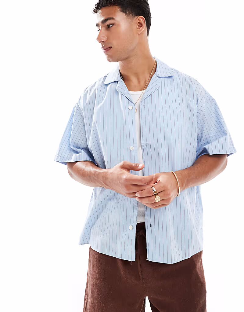 Рубашка большого размера из поплина Jack & Jones синего цвета
Рубашка большого размера из поплина Jack & Jones синего цвета