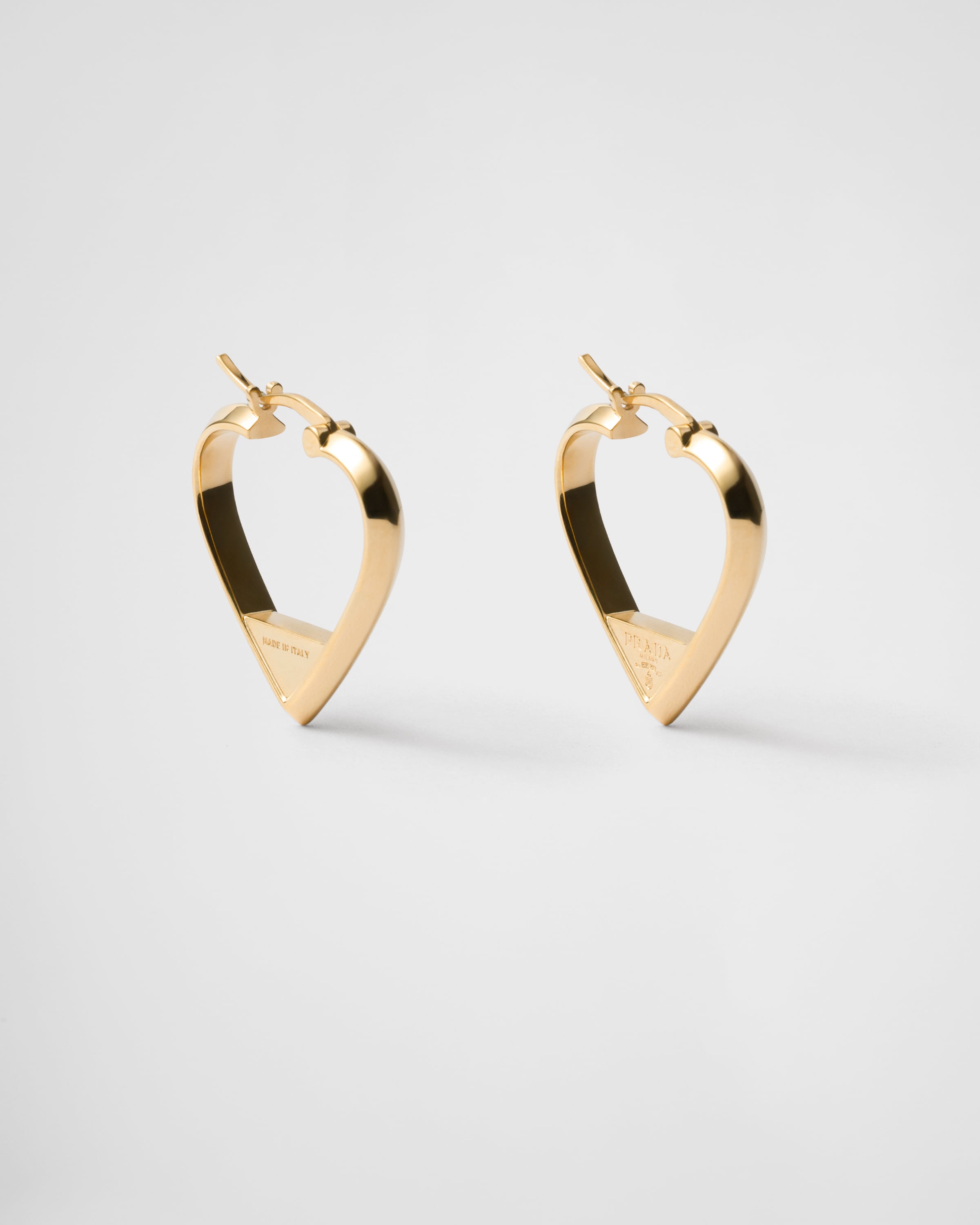 Металлические серьги Prada, золотой
Металлические серьги Prada, золотой