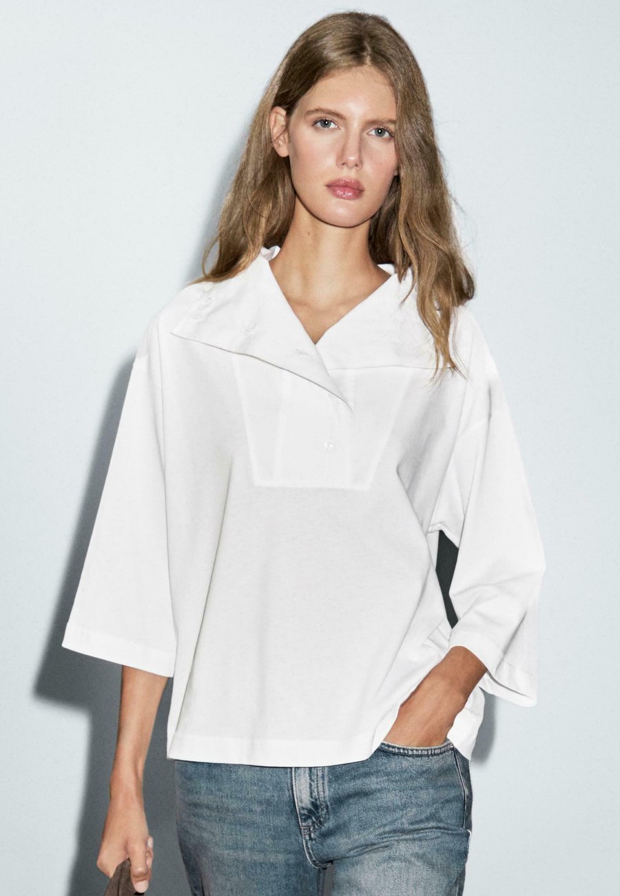 Блуза Massimo Dutti FUNNEL NECK WITH ELBOW SLEEVES, White
Блуза Massimo Dutti FUNNEL NECK WITH ELBOW SLEEVES, White