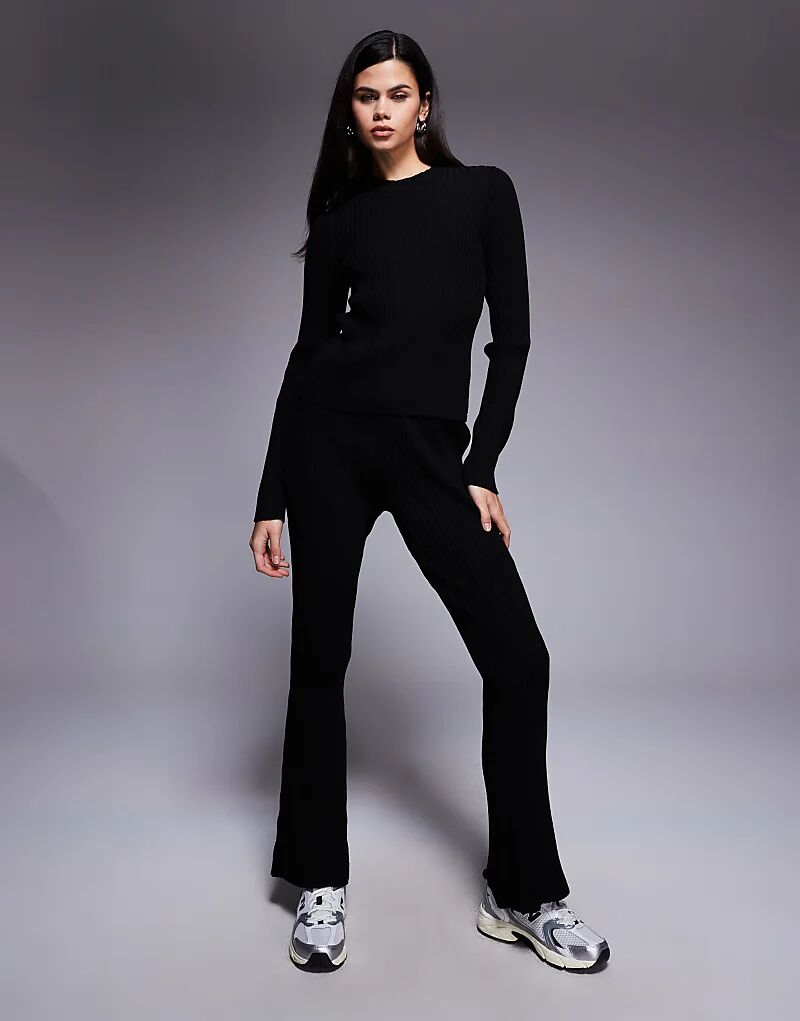 Трикотажные брюки-клеш ASOS DESIGN черного цвета
Трикотажные брюки-клеш ASOS DESIGN черного цвета