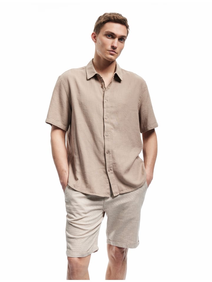 KOTON Короткие шорты с узором «верблюжьи перья»
KOTON Короткие шорты с узором «верблюжьи перья»