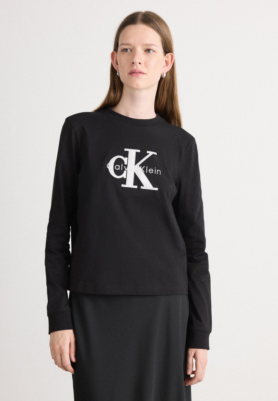 Топ Calvin Klein Jeans MONOLOGO TEE, Black
Топ Calvin Klein Jeans MONOLOGO TEE, Black