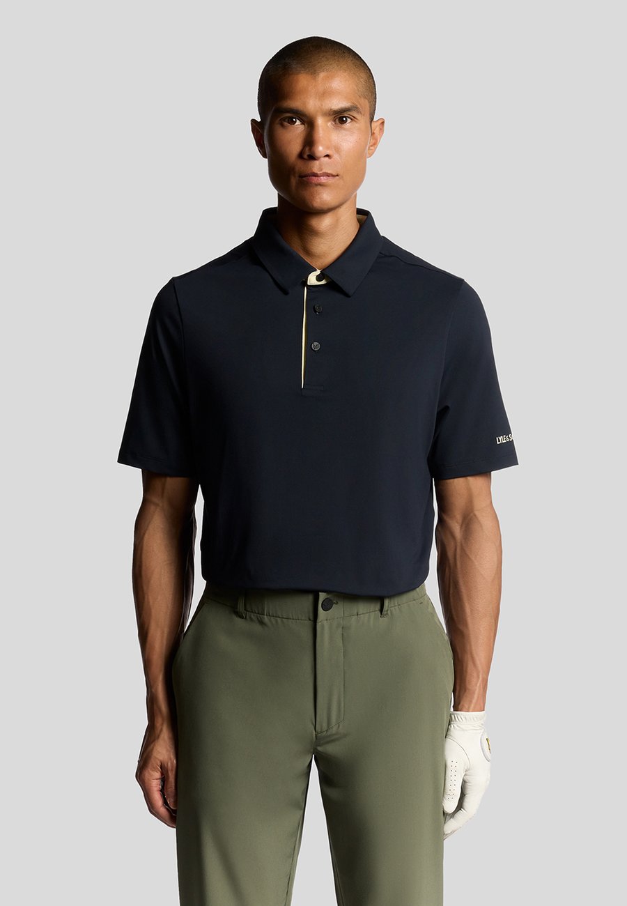 Поло Lyle & Scott SS GOLF SHANK BUTTON, Dark Navy Sunrise Yellow/Blue
Поло Lyle & Scott SS GOLF SHANK BUTTON, Dark Navy Sunrise Yellow/Blue