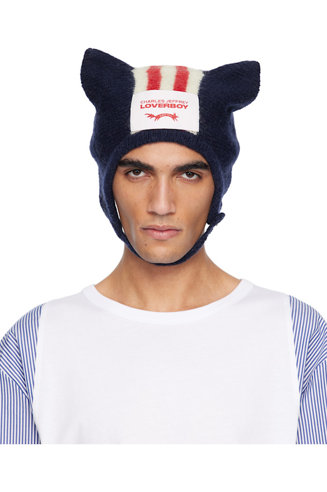 Charles Jeffrey Loverboy Шапка-Бини с темно-синими ушками
Charles Jeffrey Loverboy Шапка-Бини с темно-синими ушками